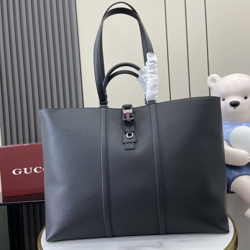 G*u*i shopping bags